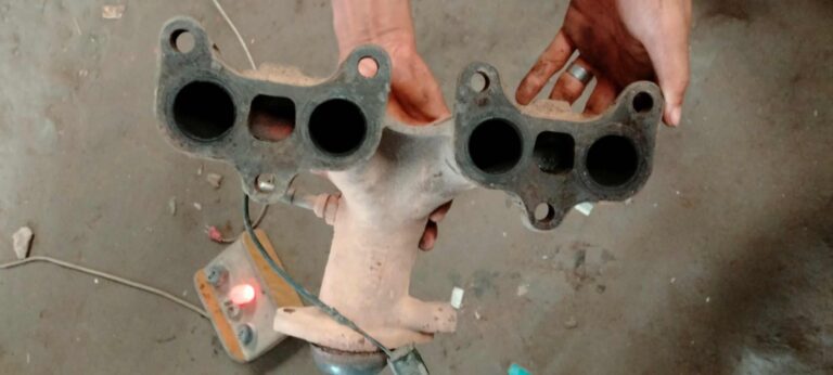 An exhaust manifold leak can cause a loss of engine power by disrupting exhaust flow and reducing backpressure, leading to decreased performance.