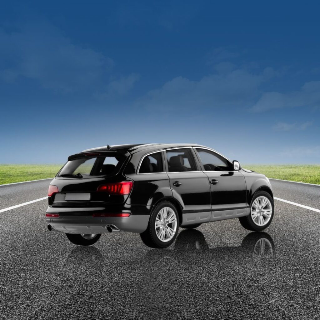 Hybrid car owner reviewing maintenance schedule and service costs with automotive expert